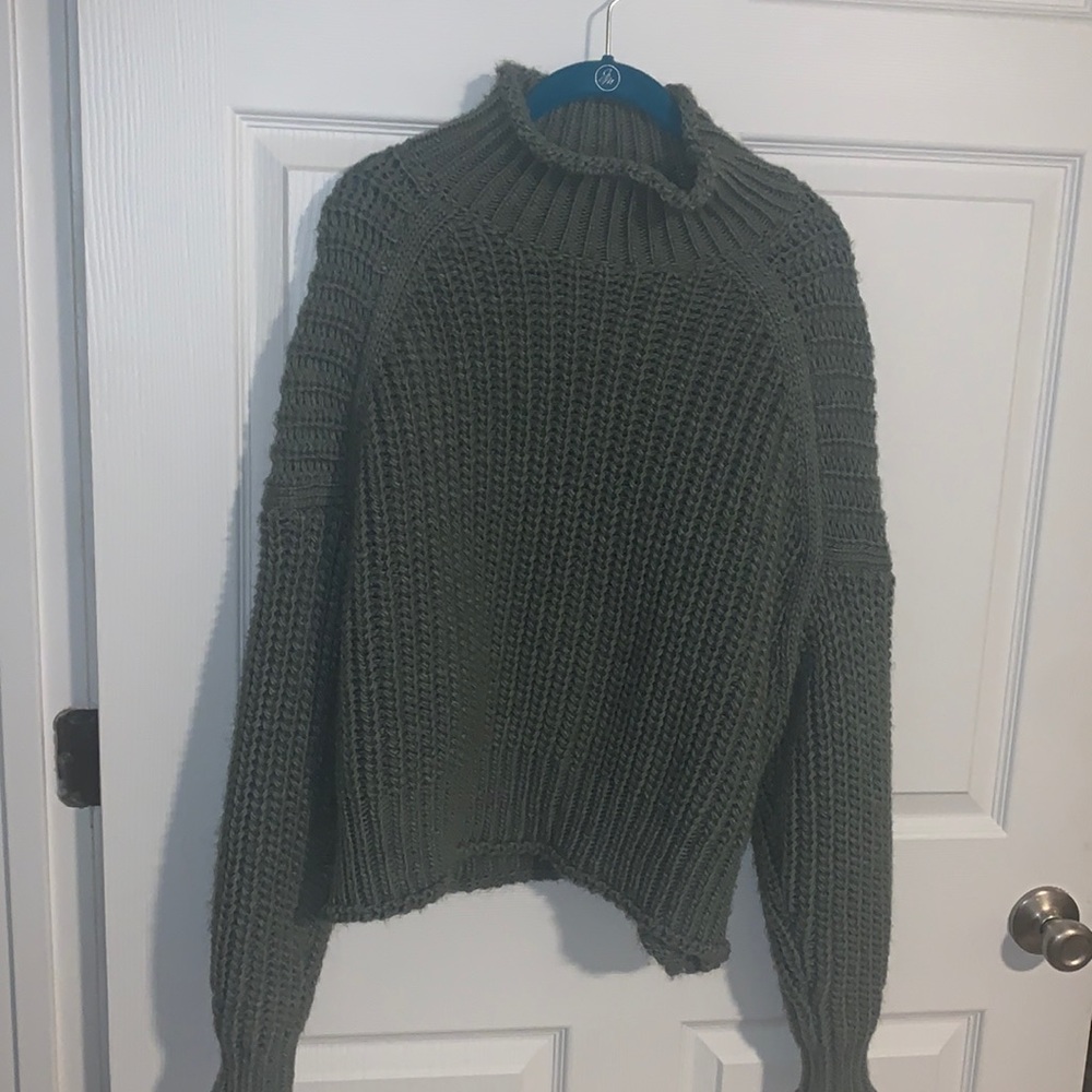 Dark green sweater